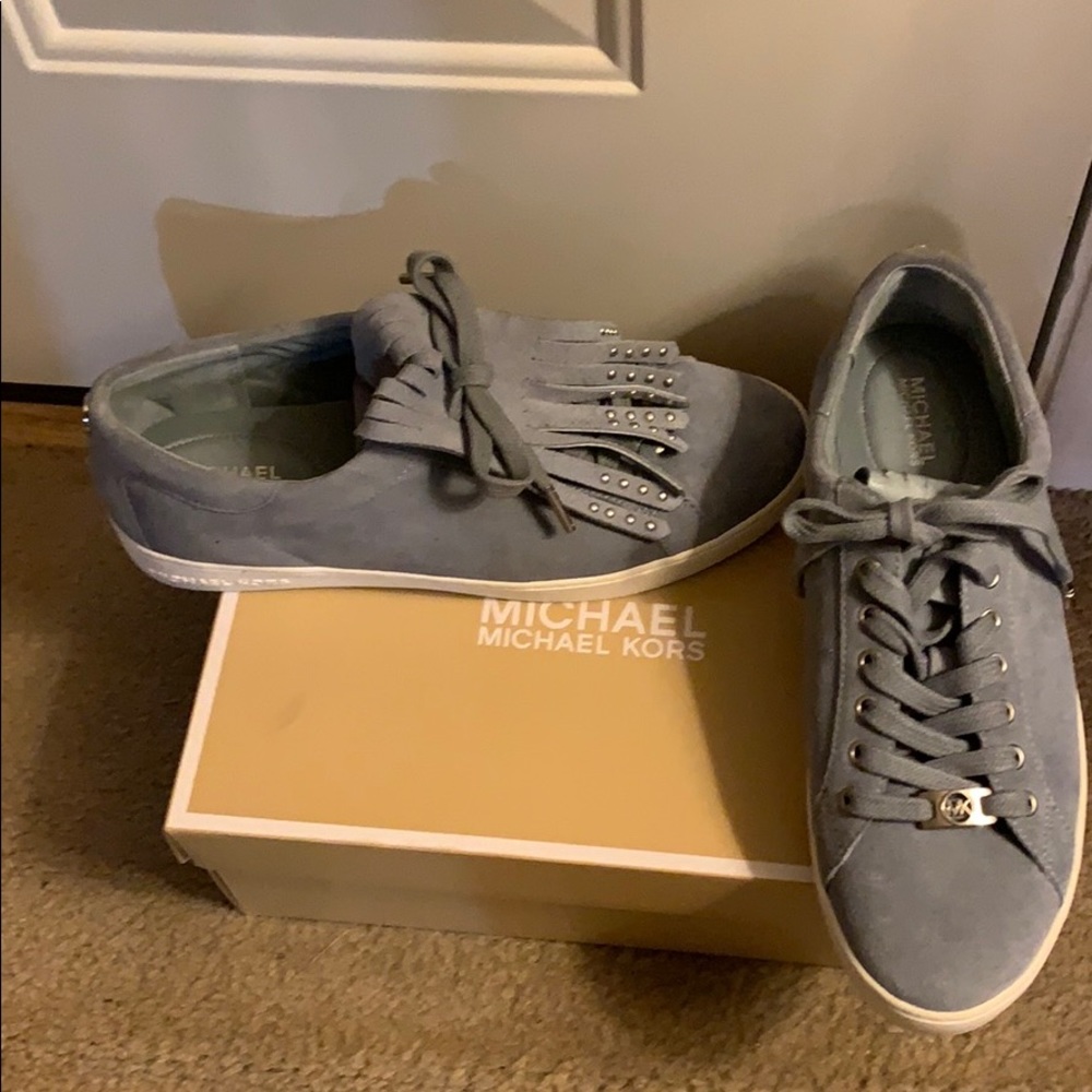 Michael Kors lt. blue suede sneaker w/kilt flap.